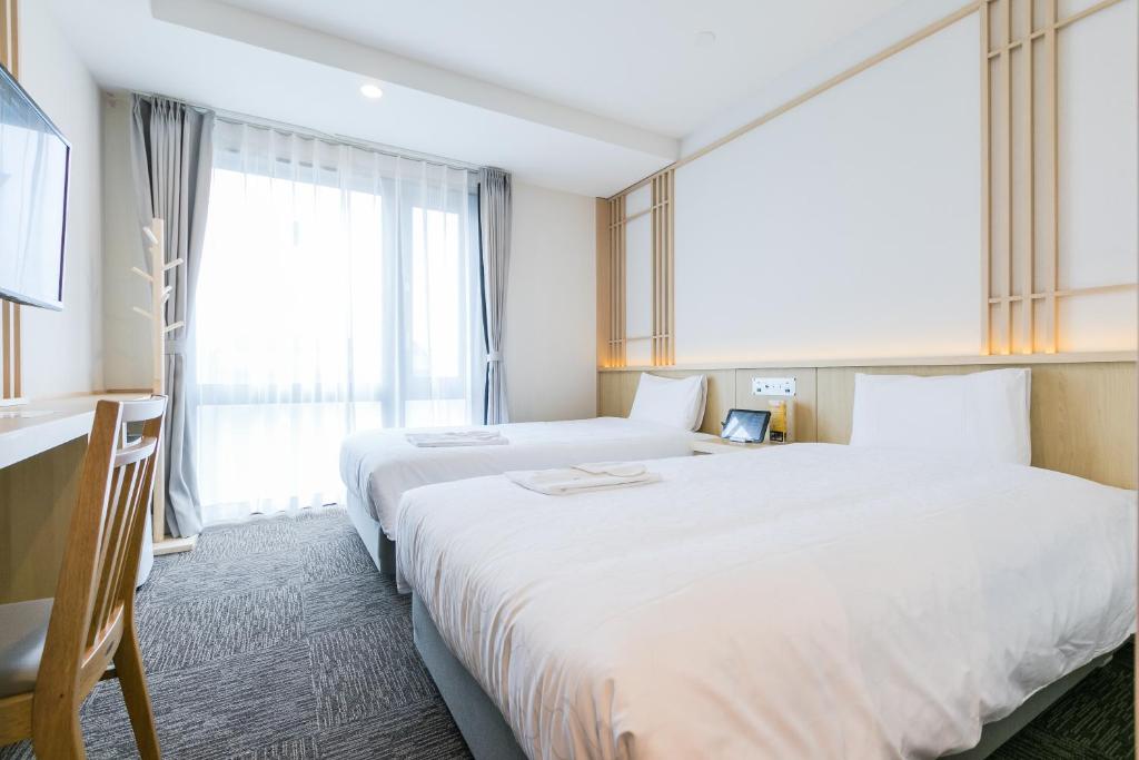 Review Henn na Hotel Premier Kyoto Eki Hachijoguchimae: A Futuristic Stay in the Heart of Kyoto