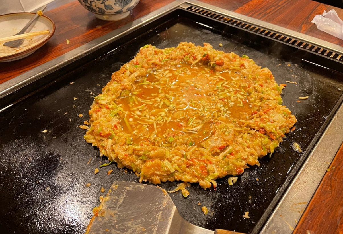 Review Monjayaki: A Sizzling Taste of Tokyo’s Soulful Street Cuisine