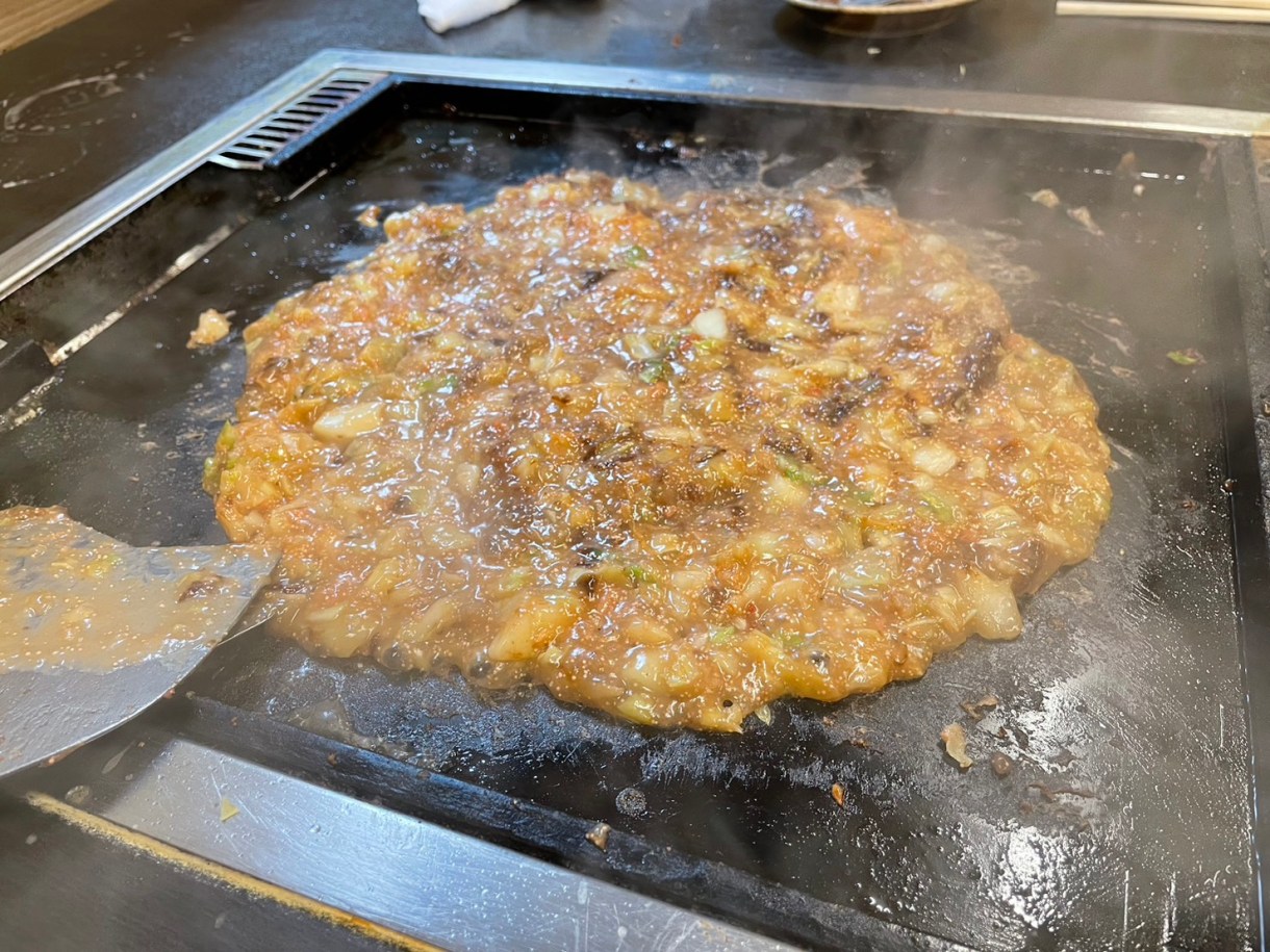 Review Monjayaki: A Sizzling Taste of Tokyo’s Soulful Street Cuisine